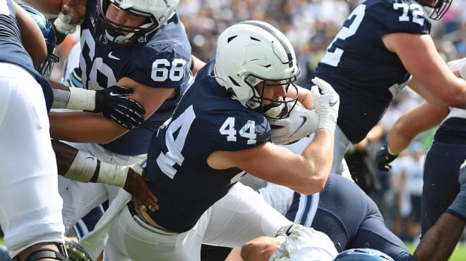 Penn State tight end Tyler Warren falls into the end zone for a touchdown during the Nittany Lions' win over Villanova. BWI photo/Steve Manuel