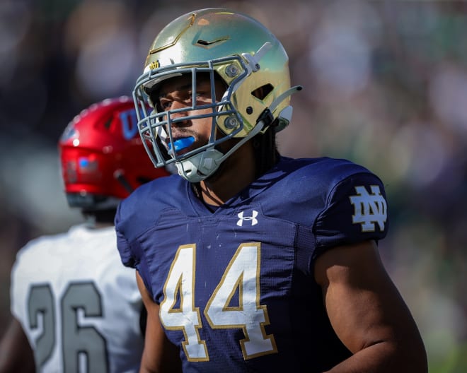 Freshman linebacker Junior Tuihalamaka made a tackle against Navy. 