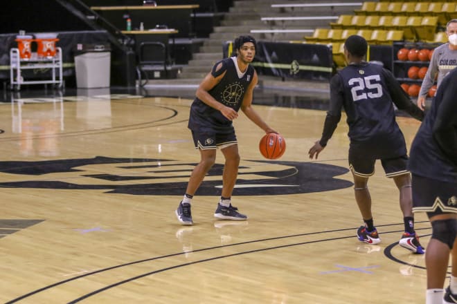 Redshirt freshman Keeshawn Barthelemy is guarded by senior point guard McKinley Wright IV