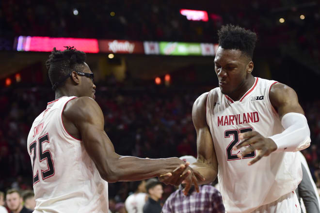  Maryland forwards Jalen Smith (25) and Bruno Fernando (23) celebrate on the court after defeating Nebraska at XFINITY Center on Jan. 2. The frontcourt duo has helped Maryland become the No. 3 rebounding team in the Big Ten this season.
