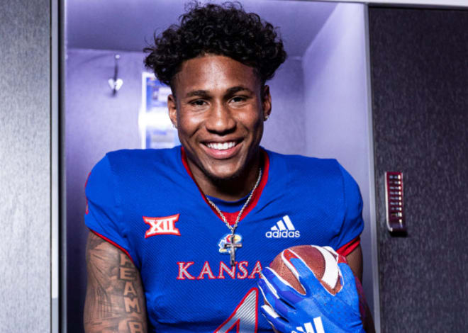 Dye and his father feel the KU football program is going in the right direction