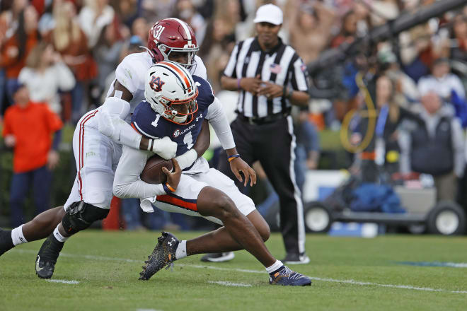 Auburn Tigers quarterback TJ Finley (1) is tackled by Alabama Crimson Tide linebacker Will Anderson Jr. (31) during the first quarter at Jordan-Hare Stadium. Mandatory Credit: John Reed-USA TODAY Sports