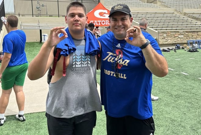 Colten Christian with Tulsa OL coach Ryan Stanchek at a recent TU camp.