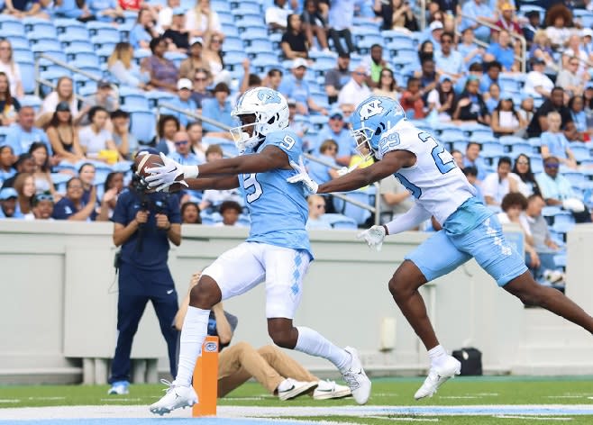 UNC WR Tez Walker is waiting on an appeal to an NCAA ruling that he must sit out this fall, but he's practicing as if he will play. 