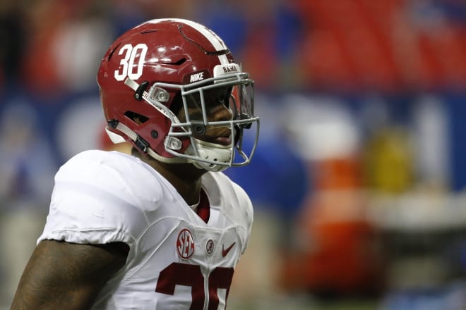 Alabama Crimson Tide linebacker Mack Wilson (30) warms up prior to the SEC Championship college football game against the Florida Gators at Georgia Dome. Photo | USA Today