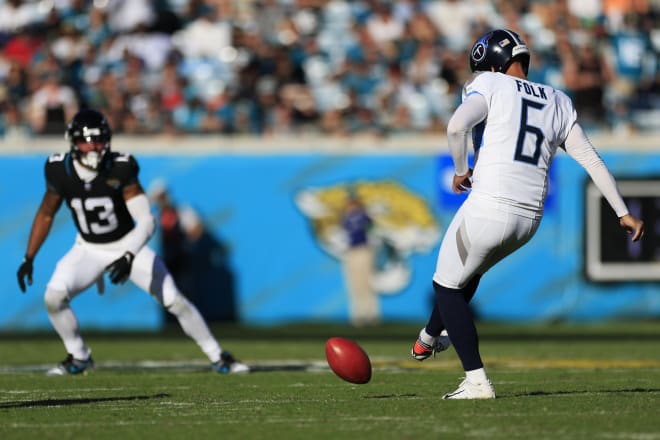 Tennessee Titans kicker Nick Folk attempts an onside kick during a game last season. 