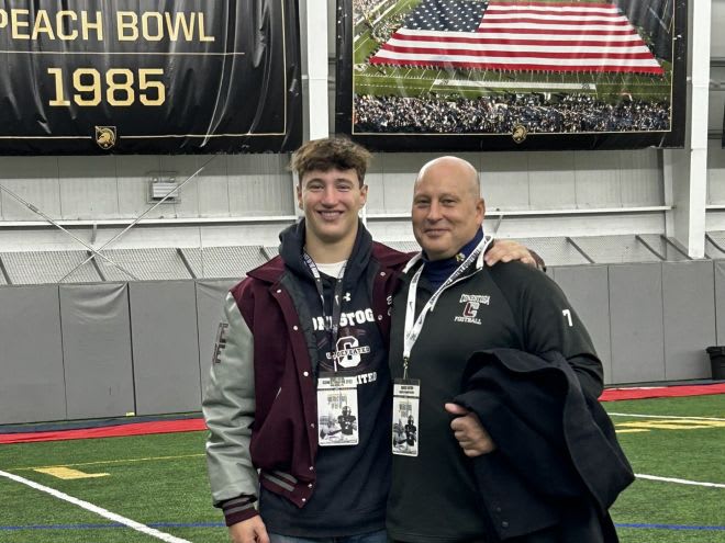 Brody (left) with his dad, David Eaton during Saturday's game day visit to West Point