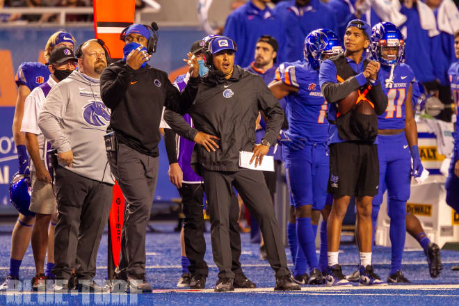Boise State head coach, Andy Avalos (center) watches from the sidelines during second half action between the Broncos and the Falcons.
