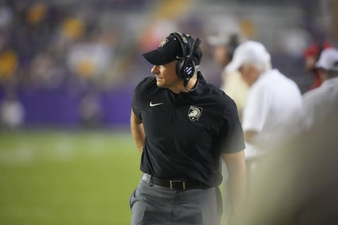 Army head coach Jeff Monken watches from the sideline in the second half of an NCAA college football game against LSU in Baton Rouge, La., Saturday, Oct. 21, 2023. LSU won 62-0. (AP Photo/Gerald Herbert)