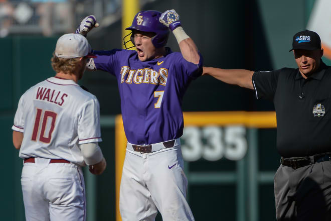 LSU outfielder Greg Deichmann celebrates a double in the second inning Wednesday as FSU shortstop Taylor Walls looks on.