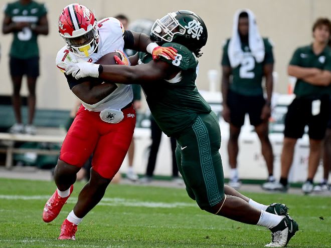 Michigan State's Simeon Barrow Jr. tackles Maryland running back Antwain Littleton on Sept. 23, 2023. 