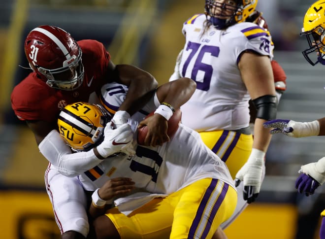 Alabama linebacker Will Anderson Jr. (31) brings down LSU quarterback T.J. Finley 