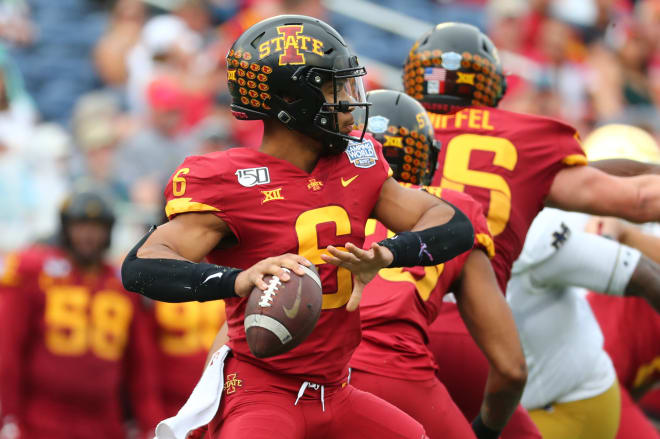 Re-Al Mitchell drops back to pass late in what will be his last game as a Cyclone, the Camping World Bowl versus Notre Dame. 