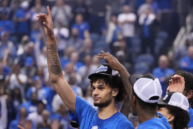 Duke's Dereck Lively II celebrates after the Blue Devils won the ACC championship this season. 