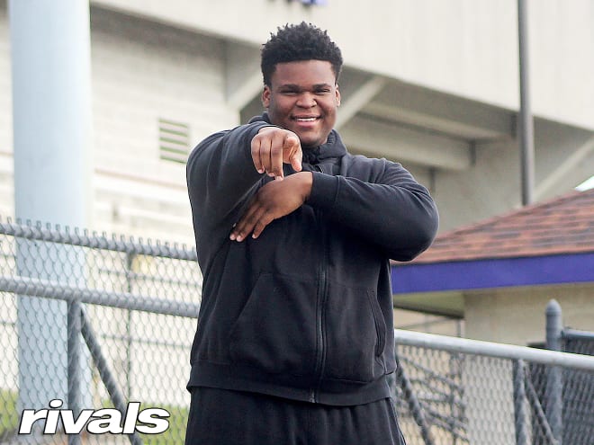 Indiana defensive tackle Kenneth Grant holds a Michigan Wolverines football recruiting offer from Jim Harbaugh.