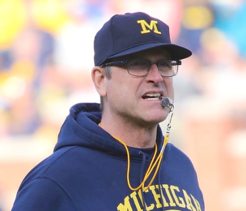 Michigan Wolverines football coach Jim Harbaugh and his team are ready to play their first game Saturday at Minnesota.