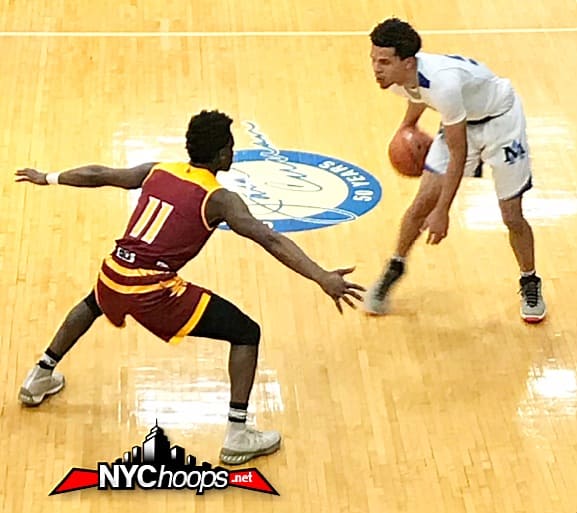 Joe Toussaint tries to contain Cole Anthony