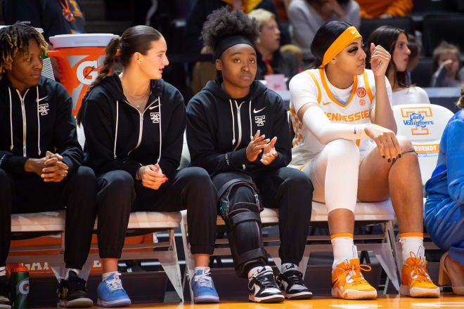 Tennessee guard Destinee Wells (10) wears a brace on the bench during a basketball game between the Lady Vols and Wofford held at at Thompson-Boling Arena at Food City Center on Tuesday, Dec. 19, 2023.