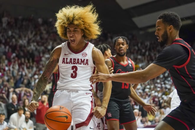 Alabama, USA; Alabama Crimson Tide guard JD Davison (3) reacts after making the go ahead point against Houston Cougars during the second half at Coleman Coliseum. Photo | USA TODAY