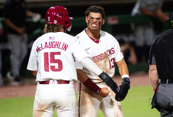 Jayson Jones celebrates one of three runs that tied the game in the eighth. Arkansas eventually fell 8-6 to Lipscomb in 11 innings.