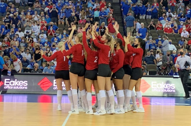 Nebraska volleyball team waves to Creighton after the match