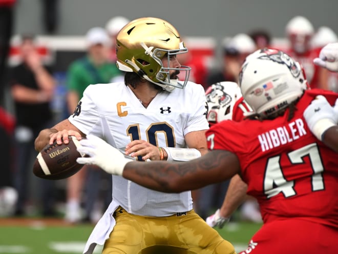 Notre Dame quarterback Sam Hartman had his share of highs and lows with four touchdown passes and two fumbles in addition to being sacked four times.