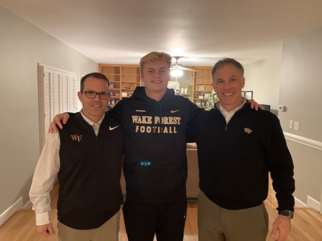 Warren Ruggiero, Mitch Griffis and Dave Clawson during his in-home earlier this month 