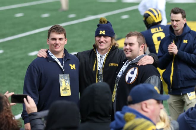 Michigan Wolverines football linemen (from left) Zach Carpenter, Karsen Barnhart and Nolan Rumler
