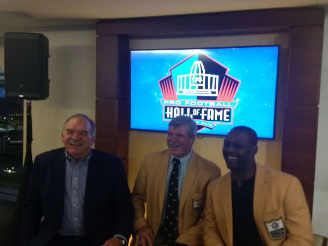 Michigan Pro Fooball Hall of Famers Dan Dierdorf, Tom Mack and Ty Law.