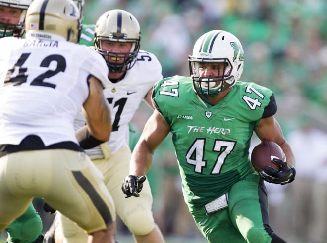 Under Chris Barclay's tutelage, Devon Johnson transformed into an all-conference running back at Marshall.