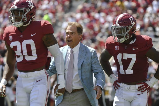 Alabama head coach Nick Saban has some words for the Crimson defense after they allowed a long touchdown run during the A-Day game at Bryant-Denny Stadium. At left is Crimson team linebacker Jihaad Campbell (30) and at right is Crimson team linebacker Trezmen Marshall (17) at Bryant-Denny Stadium. Photo | Gary Cosby-USA TODAY Sports