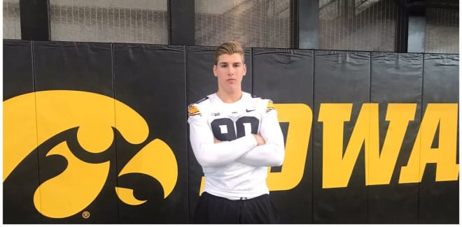 Defensive end Lukas Van Ness committed to Iowa during his official visit this weekend.