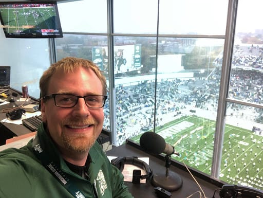 Peter Clay, known as "the voice of the Spartan Marching Band," will succeed Braverman this season. 