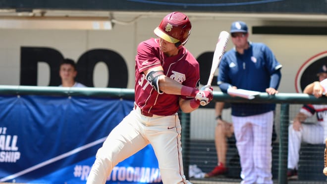 Tim Becker hit two 2-run homers in Florida State's 13-7 win over Florida Atlantic on Friday in Athens. 