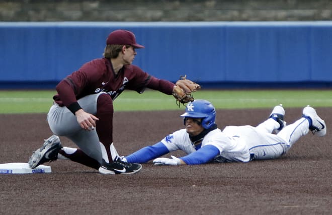 Kentucky's Ryan Ritter steals second ahead of the tag from the Bellarmine defender.