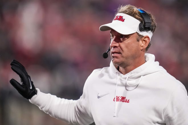 Ole Miss Rebels head coach Lane Kiffin reacts on the field against the Georgia Bulldogs during the first half at Sanford Stadium. Mandatory Credit: Dale Zanine-USA TODAY Sports