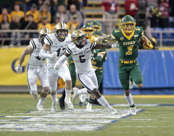 North Dakota State wide reciever Christian Watson (1) outruns the Montana State defense on a 70-yard touchdown during the Bison's national semifinal win over the Bobcats last month at the FargoDome.