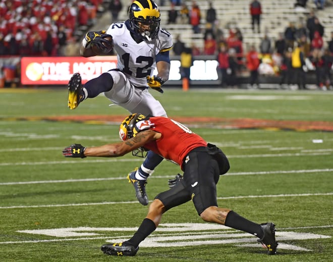 Sophomore running back Chris Evans helped Michigan hurdle Maryland for its eighth win of the season.