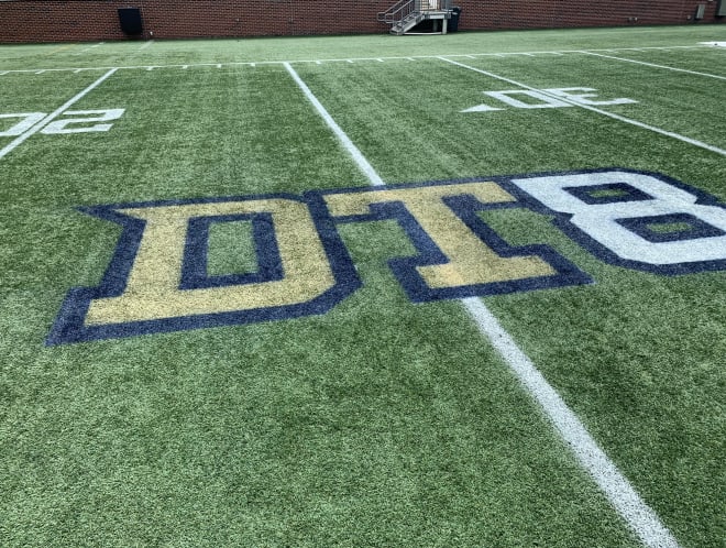 The DT8 logo on the Northeast 25-yard line near the GT Club seats
