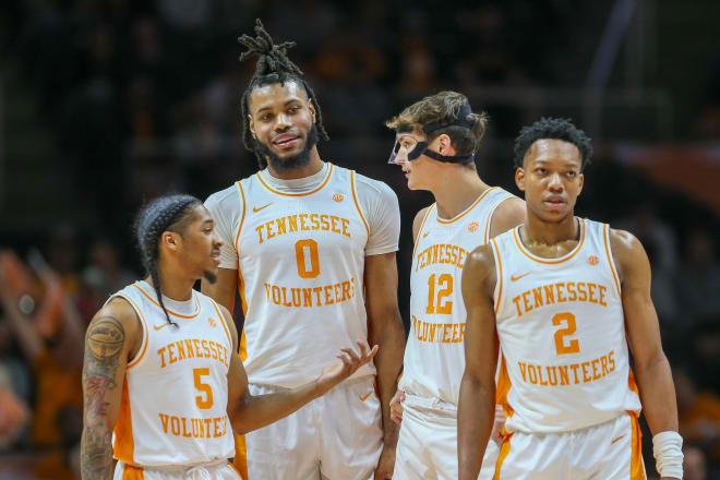 Dec 12, 2023; Knoxville, Tennessee, USA; Tennessee Volunteers guard Zakai Zeigler (5) and forward Jonas Aidoo (0) and forward Cade Phillips (12) and guard Jordan Gainey (2) during the first half against the Georgia Southern Eagles at Food City Center at Thompson-Boling Arena.