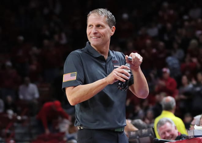 Eric Musselman goes viral for ripping shirt off after Arkansas upsets  Kansas