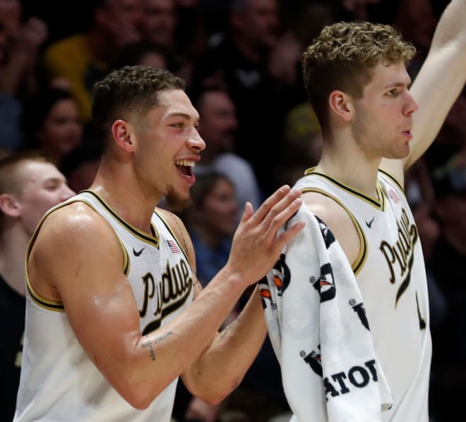 Purdue Boilermakers forward Mason Gillis (0) and Purdue Boilermakers forward Caleb Furst (1) cheer from the bench during the NCAA s men s basketball game against the Ohio State Buckeyes, Sunday, Feb. 19, 2023, at Mackey Arena in West Lafayette, Ind. Purdue won 82-55.