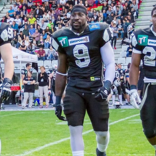 Wendell Brown playing football in China.