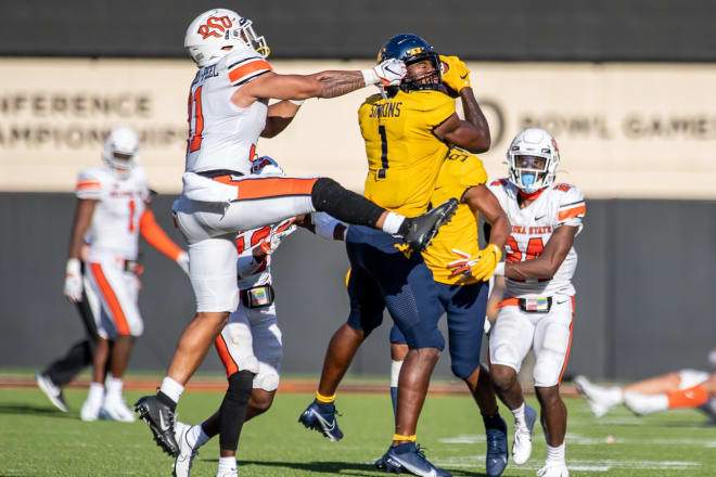 The West Virginia Mountaineers football team struggled against Oklahoma State in the passing game.
