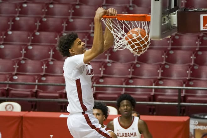 Alabama Crimson Tide forward Darius Miles (12) goes to the basket against Arkansas Razorbacks during the second half at Coleman Coliseum. Photo | Imagn 