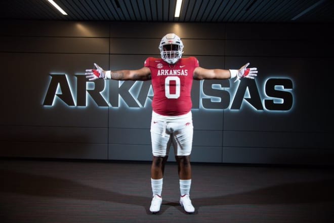 JUCO defensive tackle Taylor Lewis has committed to Arkansas.