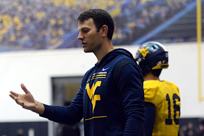 West Virginia OC Harrell is expected to take the same job at Purdue per a report.