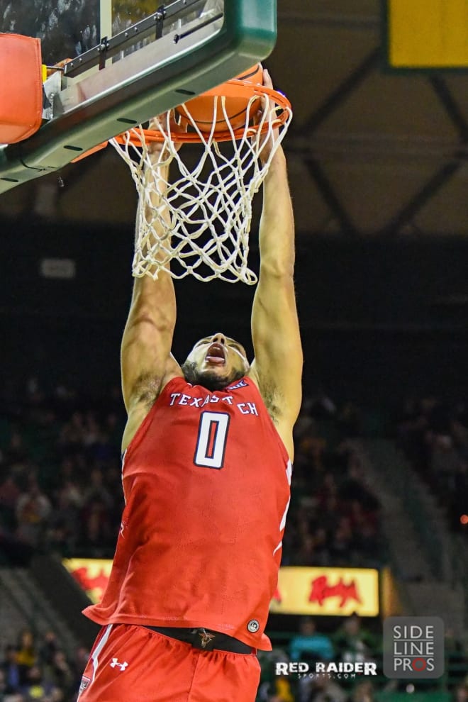Kevin Obanor (0) skies for the dunk in Texas Tech's, 65-62, upset win over Baylor
