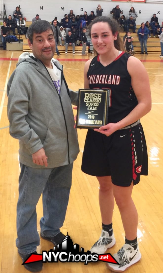 Graci Serravillo (accepting the MVP award from the Rose Classic's Petey