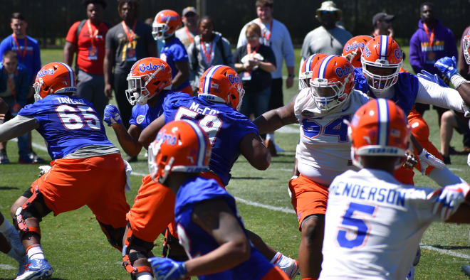 The offense and defense battling during 11-on-11 drills